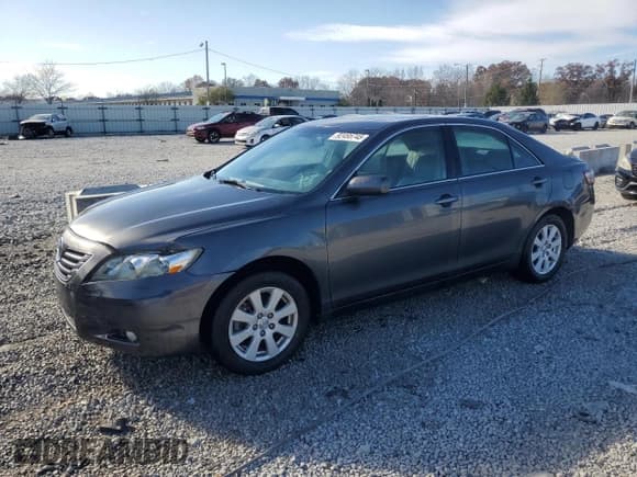 ✅ 2007 Toyota Camry LE • VIN: 4T1BK46K57U037644 • Lot: 92495745. Wystawiony na Copart z przebiegiem 191 069 mil. Bezpłatny archiwum sprzedaży aukcyjnych z USA i szczegółowy raport historii pojazdu na DreamBid. Zdjęcie 1.