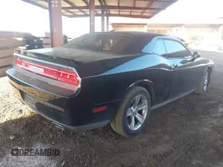 ✅ 2013 Dodge Challenger SXT • VIN: 2C3CDYAG4DH616155 • Lot: 43486536. Listed on IAAI with 129,574 mi. Free auction sales archive from the USA and detailed vehicle history report at DreamBid. Image 4.