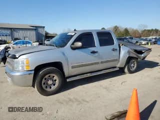 2013 Chevrolet Silverado 1500 LT with VIN 3GCPCSEA0DG292883, listed as a Copart auction lot 87326304 with 121,878 mi miles and Salvage title. Bid and sale history available at DreamBid. Image 1.