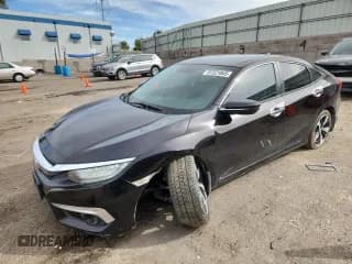 ✅ 2016 Honda Civic Touring • VIN: 2HGFC1F96GH650164 • Lot: 87221845. Listed on Copart with 53,071 mi. Free auction sales archive from the USA and detailed vehicle history report at DreamBid. Image 1.
