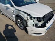 ✅ 2016 Ford Fusion Titanium • VIN: 3FA6P0SU6GR357415 • Lot: 43175119. Listed on IAAI with 92,373 mi. Free auction sales archive from the USA and detailed vehicle history report at DreamBid. Image 17.