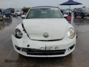 ✅ 2014 Volkswagen Beetle 2.0L TDI • VIN: 3VW5L7AT9EM823171 • Lot: 69486244. Listed on Copart with 65,557 mi. Free auction sales archive from the USA and detailed vehicle history report at DreamBid. Image 5.