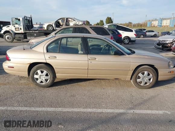 ✅ 1998 Chevrolet Lumina LS • VIN: 2G1WL52M8W9145082 • Лот: 43625724. Опубликован ранее на IAAI с пробегом 111 504 миль. Бесплатный доступ к архиву аукционных продаж из США и подробный отчёт об истории автомобиля на DreamBid. Изображение 13.