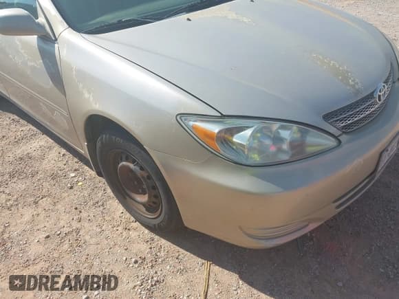 ✅ 2002 Toyota Camry LE • VIN: 4T1BE32K32U048979 • Лот: 43067932. Опубликован ранее на IAAI с пробегом 140 817 миль. Бесплатный доступ к архиву аукционных продаж из США и подробный отчёт об истории автомобиля на DreamBid. Изображение 6.