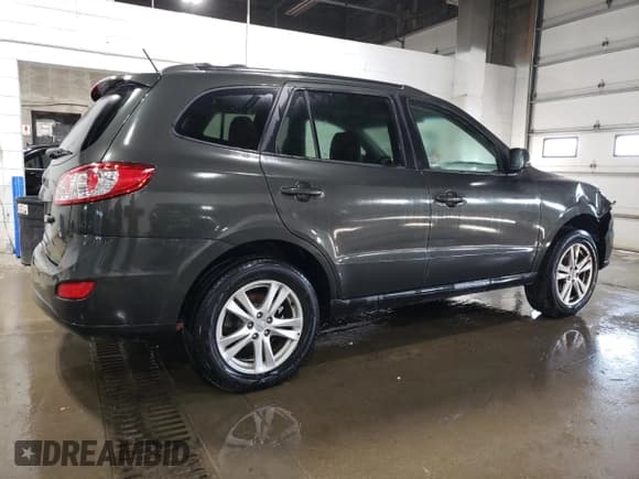 ✅ 2012 Hyundai Santa Fe SE • VIN: 5XYZH4AG3CG117525 • Lot: 75181374. Listed on Copart with 96,764 mi. Free auction sales archive from the USA and detailed vehicle history report at DreamBid. Image 3.