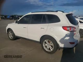 ✅ 2012 Hyundai Santa Fe Limited • VIN: 5XYZK4AG0CG104670 • Lot: 74339274. Listed on Copart with 69,102 mi. Free auction sales archive from the USA and detailed vehicle history report at DreamBid. Image 2.