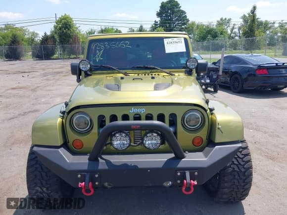 ✅ 2007 Jeep Wrangler Unlimited Sahara • VIN: 1J4GA59117L118162 • Lot: 42835652. Listed on IAAI with 199,208 mi. Free auction sales archive from the USA and detailed vehicle history report at DreamBid. Image 12.