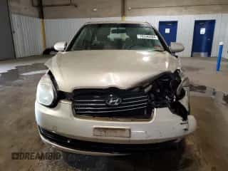 2007 Hyundai Accent GLS with VIN KMHCN46C87U103169, listed as a Copart auction lot 70390484 with 129,702 mi miles and Salvage title. Bid and sale history available at DreamBid. Image 5.