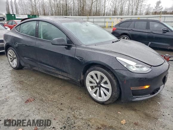 ✅ 2022 Tesla Model 3 • VIN: 5YJ3E1EA8NF370000 • Lot: 95893255. Listed on Copart with 106,623 mi. Free auction sales archive from the USA and detailed vehicle history report at DreamBid. Image 4.