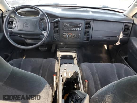 2004 Dodge Dakota SLT z VIN 1D7HG48N24S594161, wystawiony jako Copart lot #71238164 z przebiegiem Nie podano mil oraz Szkoda całkowita • Salvage title. Historia ofert i sprzedaży dostępna na DreamBid. Obrazek 8.