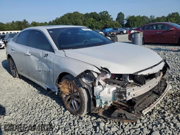 ✅ 2022 Toyota Avalon Hybrid XLE • VIN: 4T1AA1AB9NU012330 • Lot: 69209915. Listed on Copart with 76,595 mi. Free auction sales archive from the USA and detailed vehicle history report at DreamBid. Image 4.