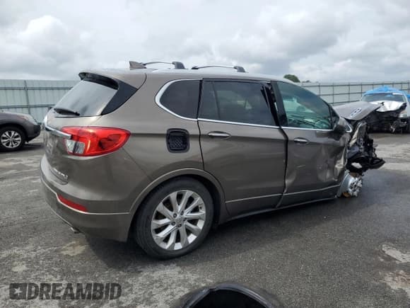 ✅ 2016 Buick Envision Premium I • VIN: LRBFXESX9GD170923 • Лот: 66548935. Опубликован ранее на Copart с пробегом 127 523 миль. Бесплатный доступ к архиву аукционных продаж из США и подробный отчёт об истории автомобиля на DreamBid. Изображение 3.