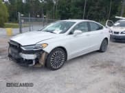 ✅ 2017 Ford Fusion Titanium • VIN: 3FA6P0K91HR316669 • Lot: 43609374. Listed on IAAI with 139,308 mi. Free auction sales archive from the USA and detailed vehicle history report at DreamBid. Image 2.