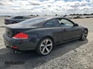 ✅ 2007 BMW 6 Series 650i • VIN: WBAEH13517CR52037 • Лот: 80124315. Опубликован ранее на Copart с пробегом 104 702 миль. Бесплатный доступ к архиву аукционных продаж из США и подробный отчёт об истории автомобиля на DreamBid. Изображение 3.