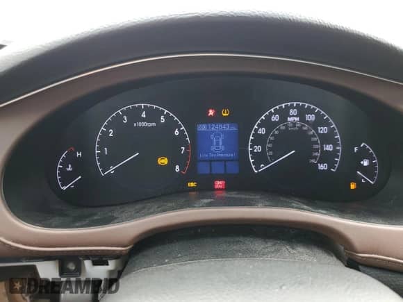 2013 Hyundai Genesis 3.8L z VIN KMHGC4DD1DU258273, wystawiony jako Copart lot #56738445 z przebiegiem 124 843 mil mil oraz Szkoda całkowita • Salvage title. Historia ofert i sprzedaży dostępna na DreamBid. Obrazek 9.