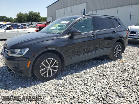 ✅ 2021 Volkswagen Tiguan S • VIN: 3VV1B7AX2MM020872 • Lot: 57106925. Listed on Copart with 92,908 mi. Free auction sales archive from the USA and detailed vehicle history report at DreamBid. Image 1.
