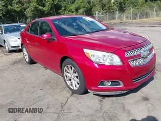 2013 Chevrolet Malibu LTZ z VIN 1G11H5SA5DF266982, wystawiony jako IAAI lot #43116035 z przebiegiem 232 497 mil mil oraz . Historia ofert i sprzedaży dostępna na DreamBid. Obrazek 1.