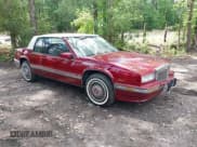 ✅ 1990 Cadillac Eldorado • VIN: 1G6EL1333LU608572 • Lot: 42191060. Listed on IAAI with 105,433 mi. Free auction sales archive from the USA and detailed vehicle history report at DreamBid. Image 1.