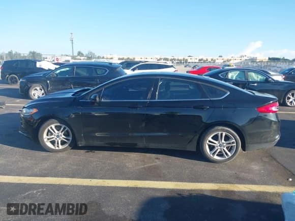 ✅ 2018 Ford Fusion SE • VIN: 3FA6P0H73JR121930 • Лот: 43522845. Опубликован ранее на IAAI с пробегом 92 886 миль. Бесплатный доступ к архиву аукционных продаж из США и подробный отчёт об истории автомобиля на DreamBid. Изображение 14.