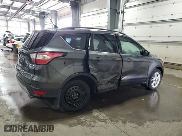 ✅ 2018 Ford Escape SEL • VIN: 1FMCU9HD8JUB25573 • Lot: 71280885. Listed on Copart with 125,289 mi. Free auction sales archive from the USA and detailed vehicle history report at DreamBid. Image 3.