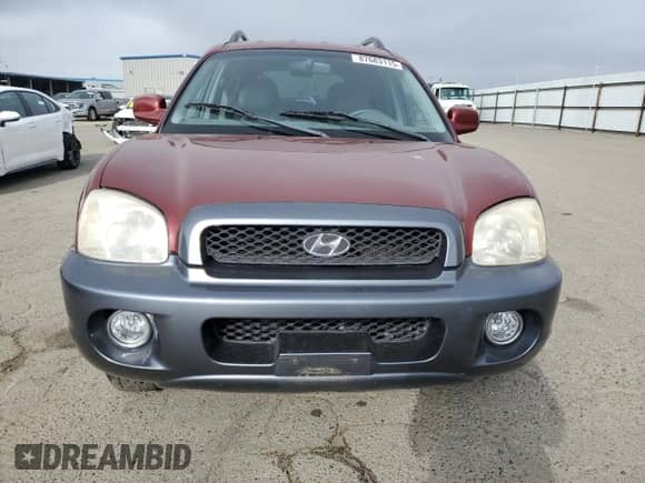 2002 Hyundai Santa Fe GLS z VIN KM8SC13D02U173092, wystawiony jako Copart lot #87683115 z przebiegiem 96 950 mil mil oraz Szkoda całkowita • Salvage title. Historia ofert i sprzedaży dostępna na DreamBid. Obrazek 5.