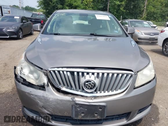 ✅ 2012 Buick LaCrosse • VIN: 1G4GA5ER4CF242450 • Lot: 42897859. Listed on IAAI with 178,899 mi. Free auction sales archive from the USA and detailed vehicle history report at DreamBid. Image 12.