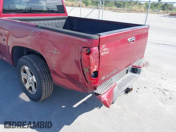 2010 Chevrolet Colorado 1LT z VIN 1GCESCD93A8100185, wystawiony jako IAAI lot #41471766 z przebiegiem 196 946 mil mil oraz . Historia ofert i sprzedaży dostępna na DreamBid. Obrazek 6.