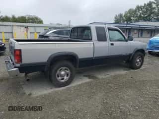 1994 Dodge Dakota z VIN 1B7GG23Y9RS590756, wystawiony jako Copart lot #66048685 z przebiegiem 127 408 mil mil oraz Szkoda całkowita • Salvage title. Historia ofert i sprzedaży dostępna na DreamBid. Obrazek 3.