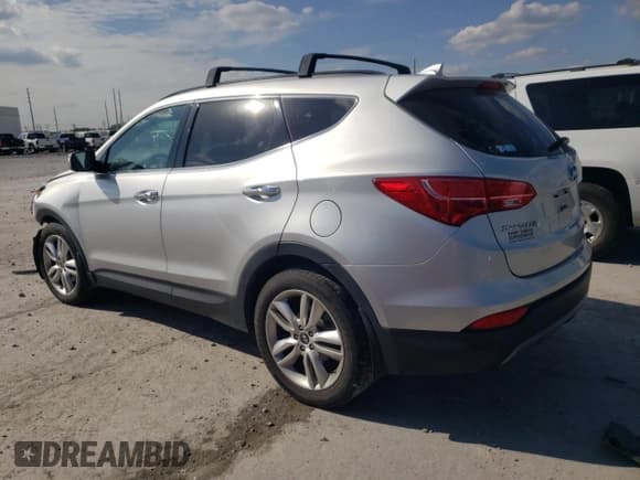 ✅ 2015 Hyundai Santa Fe • VIN: 5XYZWDLA0FG293175 • Лот: 67732893. Опубликован ранее на Copart с пробегом 121 014 миль. Бесплатный доступ к архиву аукционных продаж из США и подробный отчёт об истории автомобиля на DreamBid. Изображение 2.