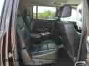 2017 Chevrolet Suburban Premier z VIN 1GNSKJKC4HR288782, wystawiony jako Copart lot #68502444 z przebiegiem 174 498 mil mil oraz Czysty tytuł • Clean title. Historia ofert i sprzedaży dostępna na DreamBid. Obrazek 11.