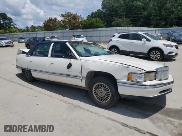 ✅ 1994 Cadillac DeVille • VIN: 1G6KD52BXRU286912 • Lot: 65770585. Listed on Copart with 228,322 mi. Free auction sales archive from the USA and detailed vehicle history report at DreamBid. Image 4.