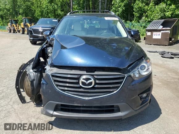 ✅ 2016 Mazda CX-5 Grand Touring • VIN: JM3KE4DY1G0885876 • Lot: 61382575. Listed on Copart with 124,491 mi. Free auction sales archive from the USA and detailed vehicle history report at DreamBid. Image 5.