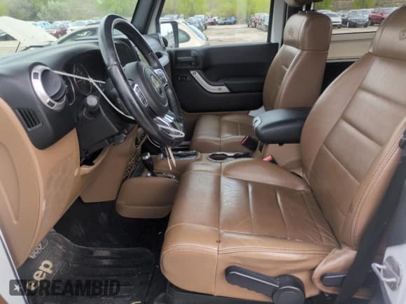 ✅ 2011 Jeep Wrangler Sahara • VIN: 1J4AA5D16BL560683 • Lot: 55323425. Listed on Copart with 103,405 mi. Free auction sales archive from the USA and detailed vehicle history report at DreamBid. Image 7.