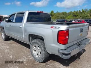 ✅ 2015 Chevrolet Silverado 1500 LT • VIN: 3GCUKREC5FG470922 • Lot: 43490136. Wystawiony na IAAI z przebiegiem 196 873 mil. Bezpłatny archiwum sprzedaży aukcyjnych z USA i szczegółowy raport historii pojazdu na DreamBid. Zdjęcie 3.