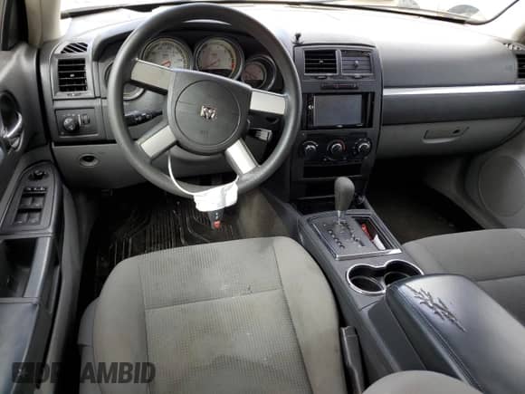 2008 Dodge Charger SXT с VIN 2B3KA33G18H275644, выставлен на аукционе Copart как лот 71127934 с пробегом 163 826 миль миль и Списание • Salvage title. История ставок и продаж доступна на DreamBid. Изображение 8.