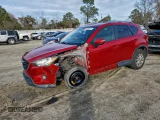 ✅ 2016 Mazda CX-5 Touring • VIN: JM3KE2CY6G0646992 • Lot: 94860415. Listed on Copart with 79,298 mi. Free auction sales archive from the USA and detailed vehicle history report at DreamBid. Image 1.