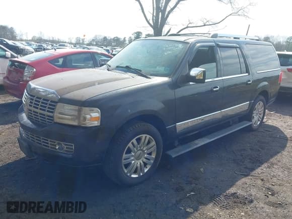 ✅ 2014 Lincoln Navigator • VIN: 5LMJJ3J56EEL04885 • Lot: 42051762. Listed on IAAI with 162,851 mi. Free auction sales archive from the USA and detailed vehicle history report at DreamBid. Image 18.