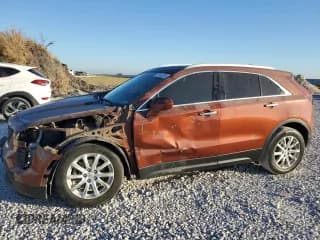 ✅ 2020 Cadillac XT4 FWD Luxury • VIN: 1GYAZAR4XLF030978 • Лот: 76141074. Опубликован ранее на Copart с пробегом 58 582 миль. Бесплатный доступ к архиву аукционных продаж из США и подробный отчёт об истории автомобиля на DreamBid. Изображение 1.