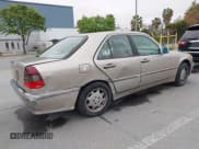 ✅ 1999 Mercedes-Benz C 230/260/280/320 • VIN: WDBHA29G8XA784619 • Lot: 42120920. Listed on IAAI with 49,387 mi. Free auction sales archive from the USA and detailed vehicle history report at DreamBid. Image 4.