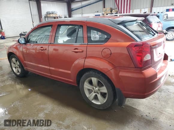 ✅ 2010 Dodge Caliber Mainstreet • VIN: 1B3CB3HA2AD567599 • Лот: 84420764. Опубликован ранее на Copart с пробегом 106 540 миль. Бесплатный доступ к архиву аукционных продаж из США и подробный отчёт об истории автомобиля на DreamBid. Изображение 2.