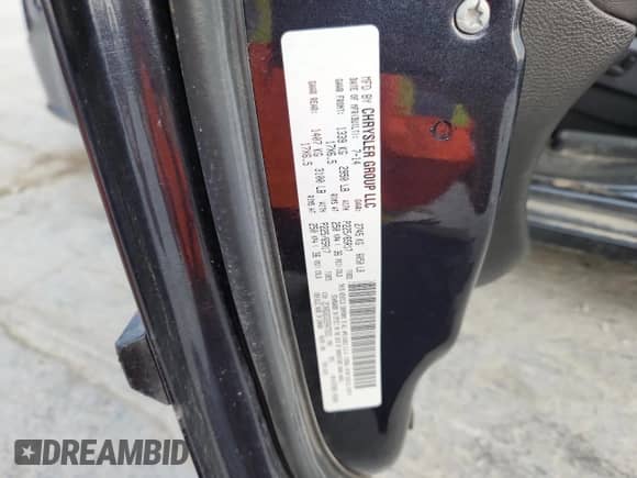 2014 Dodge Grand Caravan R/T with VIN 2C4RDGEG5ER472931, listed as a Copart auction lot 82223975 with 197,678 mi miles and Salvage title. Bid and sale history available at DreamBid. Image 13.