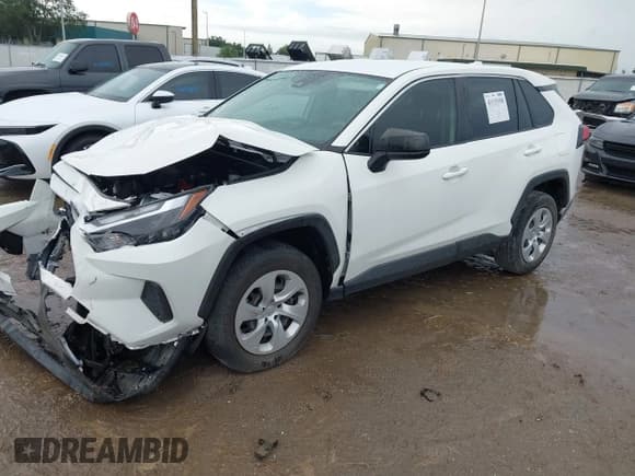 ✅ 2023 Toyota RAV4 LE • VIN: JTMH1RFV9PD100527 • Lot: 43135358. Listed on IAAI with 50,162 mi. Free auction sales archive from the USA and detailed vehicle history report at DreamBid. Image 2.