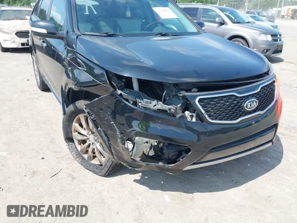 ✅ 2012 Kia Sorento SX • VIN: 5XYKW4A2XCG232506 • Лот: 42740284. Опубликован ранее на IAAI с пробегом 140 990 миль. Бесплатный доступ к архиву аукционных продаж из США и подробный отчёт об истории автомобиля на DreamBid. Изображение 6.