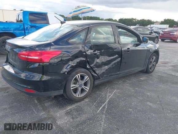 ✅ 2016 Ford Focus SE • VIN: 1FADP3FE7GL215777 • Lot: 43480286. Listed on IAAI with 70,597 mi. Free auction sales archive from the USA and detailed vehicle history report at DreamBid. Image 4.