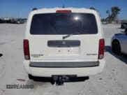 ✅ 2010 Dodge Nitro SE • VIN: 1D4PT2GK7AW112398 • Lot: 91642865. Wystawiony na Copart z przebiegiem 126 917 mil. Bezpłatny archiwum sprzedaży aukcyjnych z USA i szczegółowy raport historii pojazdu na DreamBid. Zdjęcie 6.