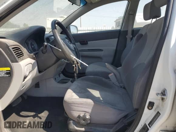 2010 Hyundai Accent GLS z VIN KMHCN4AC2AU480451, wystawiony jako Copart lot #69716034 z przebiegiem 162 717 mil mil oraz Szkoda całkowita • Salvage title. Historia ofert i sprzedaży dostępna na DreamBid. Obrazek 7.