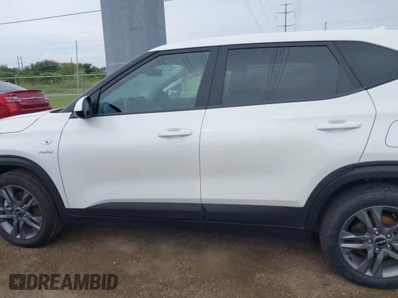 ✅ 2023 Kia Seltos LX • VIN: KNDEPCAA4P7369164 • Lot: 43299190. Listed on IAAI with 10,255 mi. Free auction sales archive from the USA and detailed vehicle history report at DreamBid. Image 14.