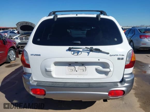 ✅ 2004 Hyundai Santa Fe GLS • VIN: KM8SC13E44U672070 • Lot: 43383997. Listed on IAAI with 219,150 mi. Free auction sales archive from the USA and detailed vehicle history report at DreamBid. Image 16.
