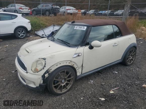 ✅ 2009 MINI Convertible S • VIN: WMWMS33539TG89385 • Lot: 82756675. Listed on Copart with 96,228 mi. Free auction sales archive from the USA and detailed vehicle history report at DreamBid. Image 1.