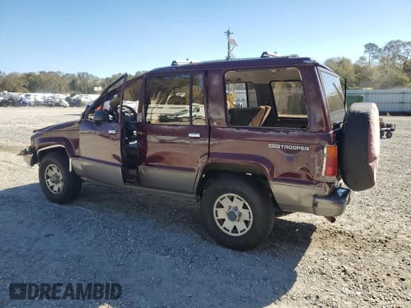 ✅ 1991 Isuzu Trooper • VIN: JACCH58R7M7908298 • Lot: 92269805. Listed on Copart with 243,212 mi. Free auction sales archive from the USA and detailed vehicle history report at DreamBid. Image 2.
